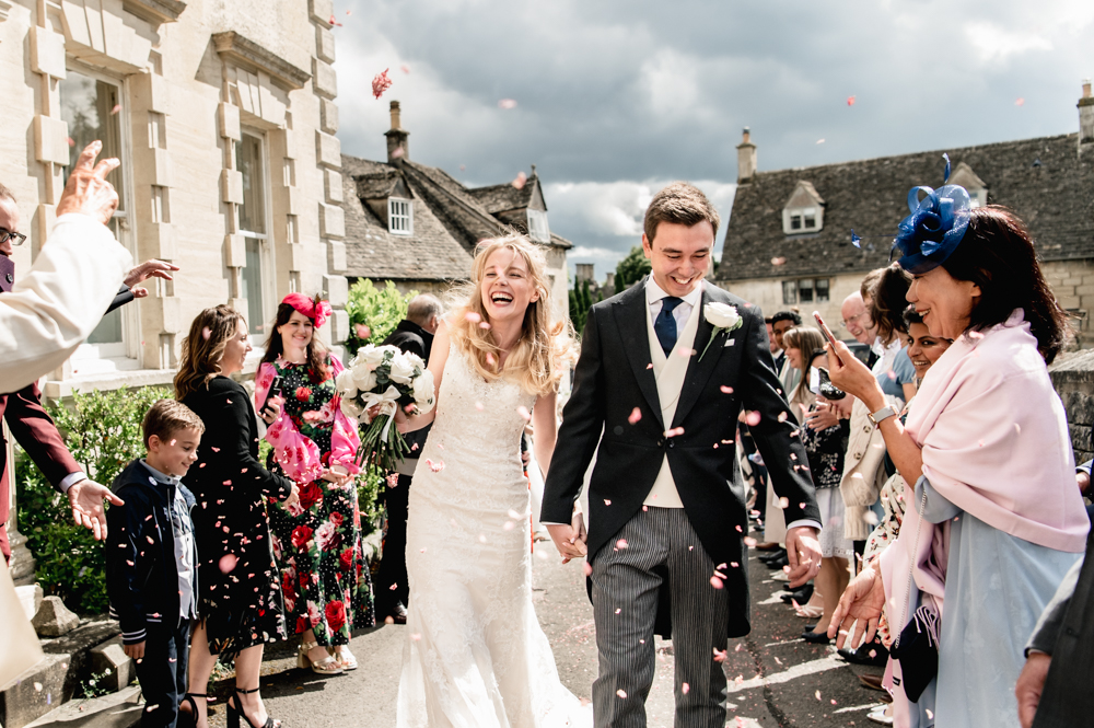 dreamy village wedding confetti toss
