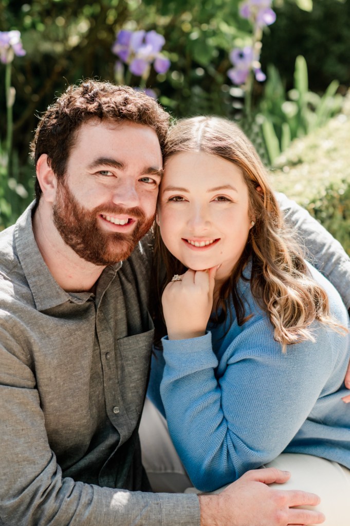 couple portrait engagement ring