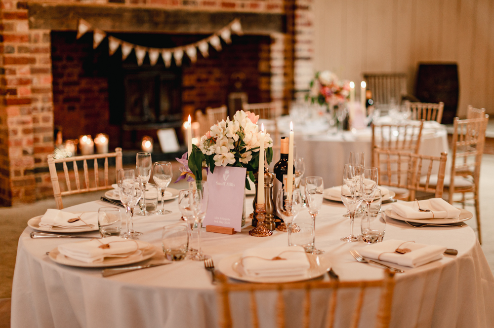 table decor at a rustic  milton end barn wedding venue gloucestershire