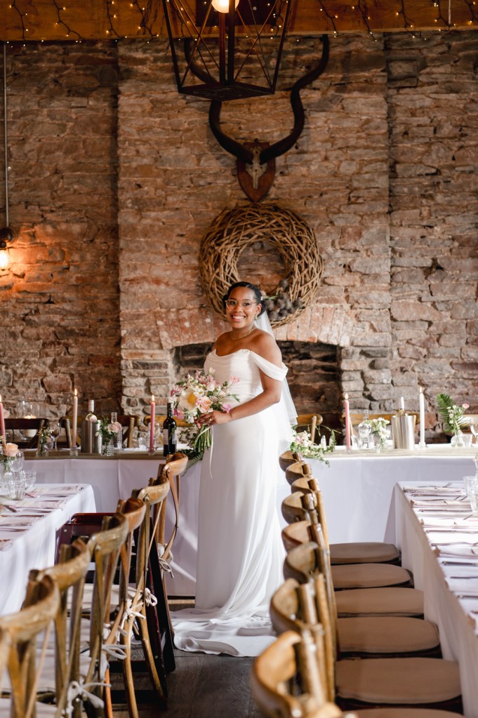 bride in a barn wedding venue gloucestershire