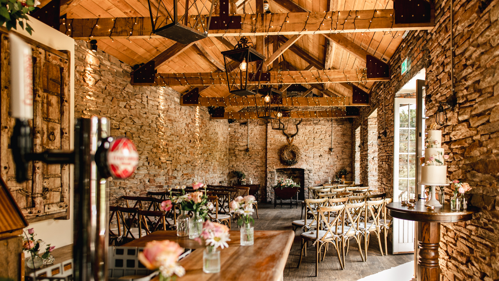 rustic barn set up for wedding ceremony at white horse hambrook