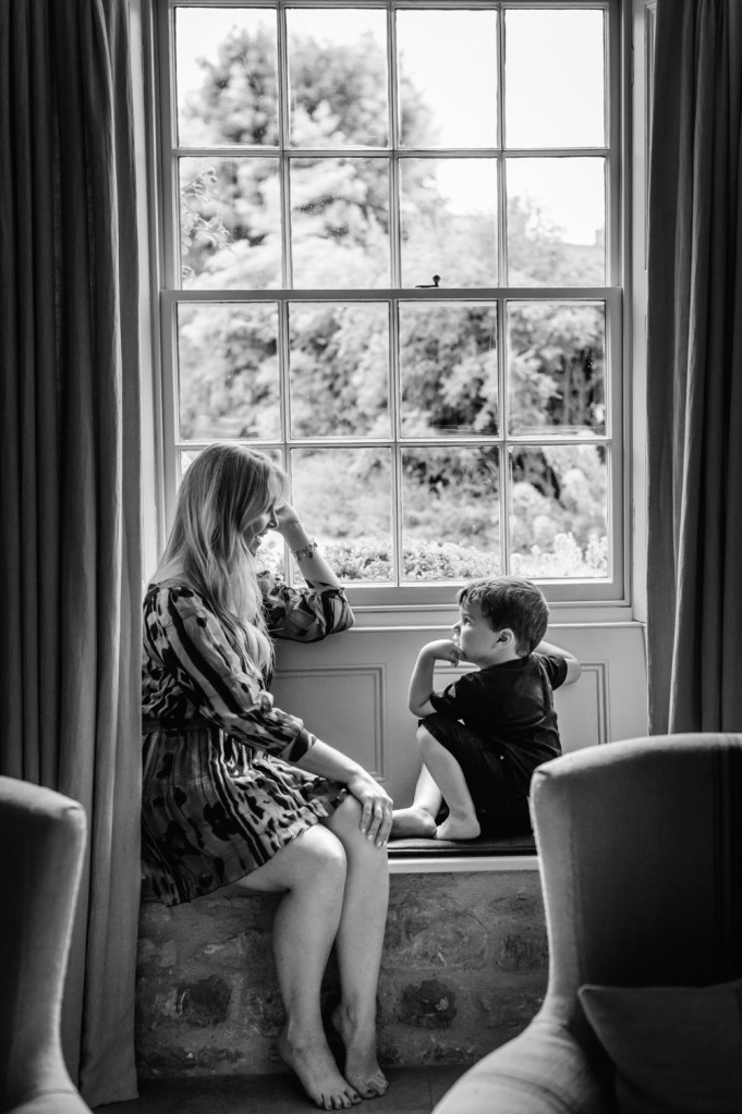 woman and boy romantic silhouette in the window