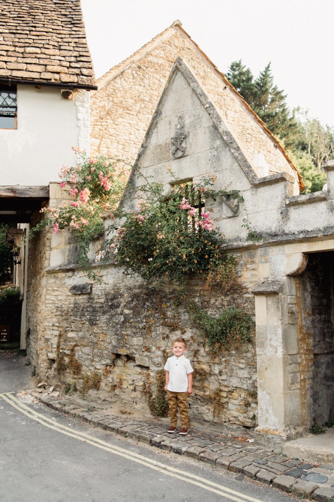 boy in a cotswold village