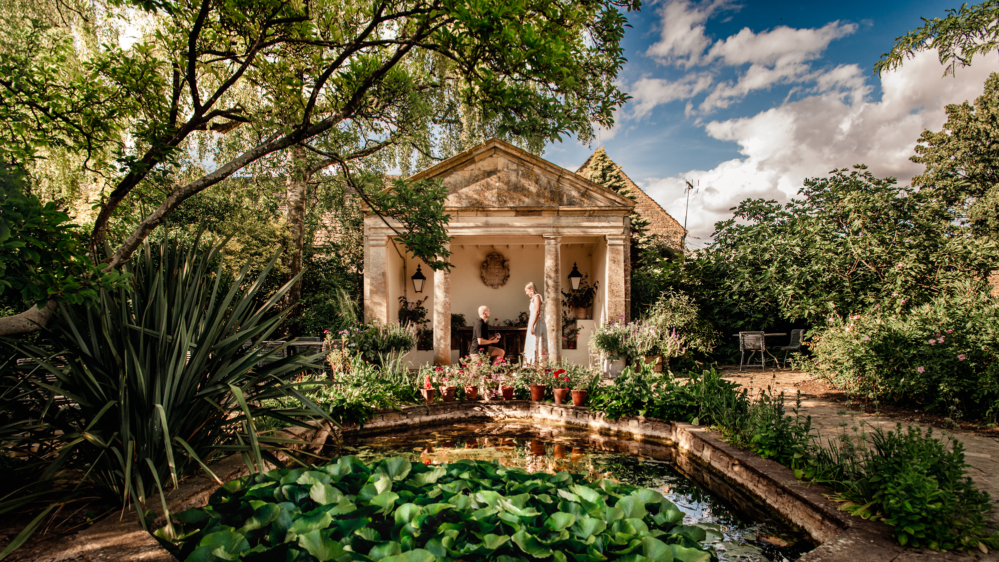 proposal in a stunning garden cotswolds