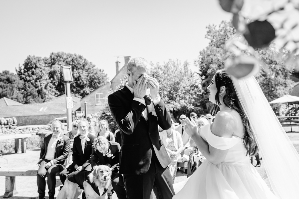 groom crying wedding ceremony