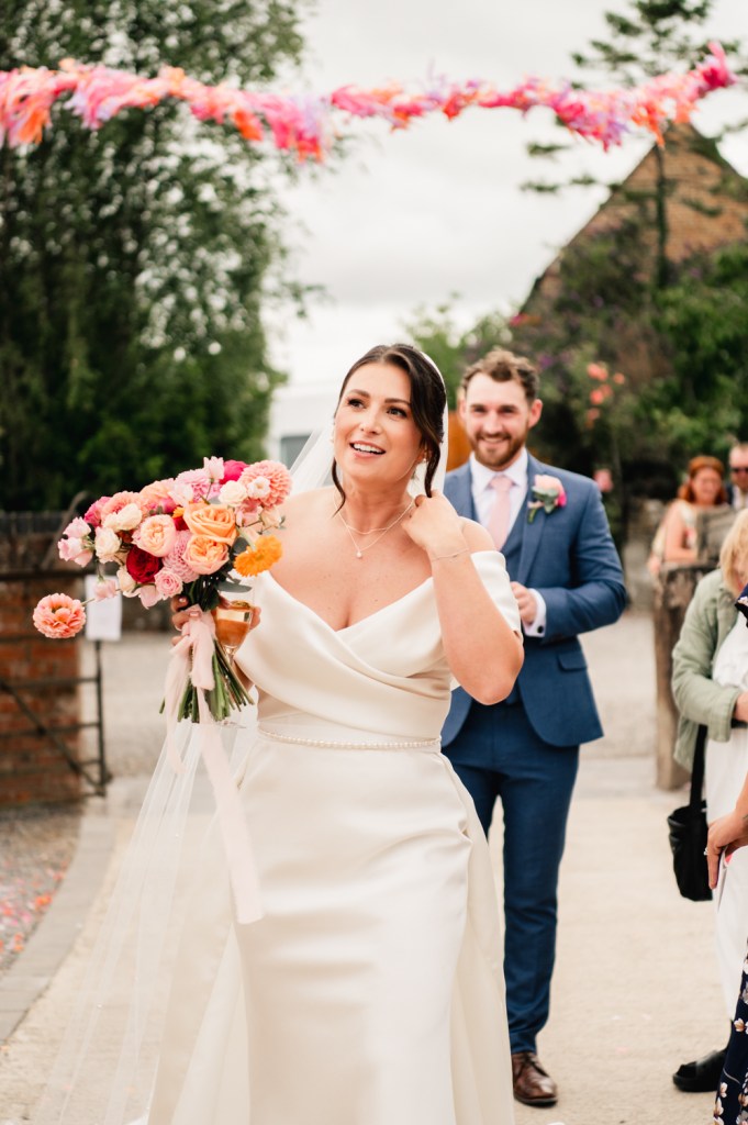 bride walking candid photos