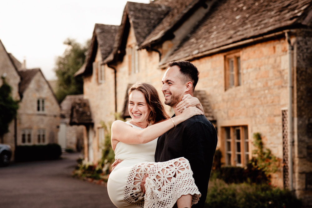 couple laughing proposal photography cotswolds