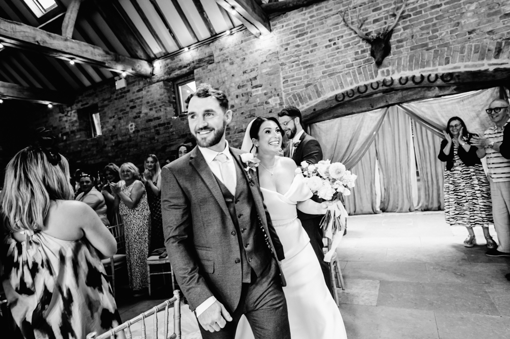 bride and groom natural walking