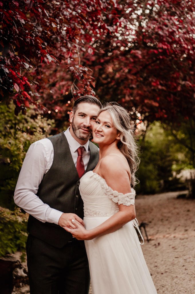 wedding couple matara red autumn backdrop 