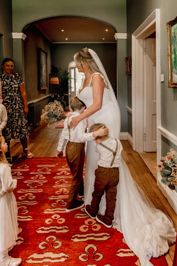 bride hugging kids