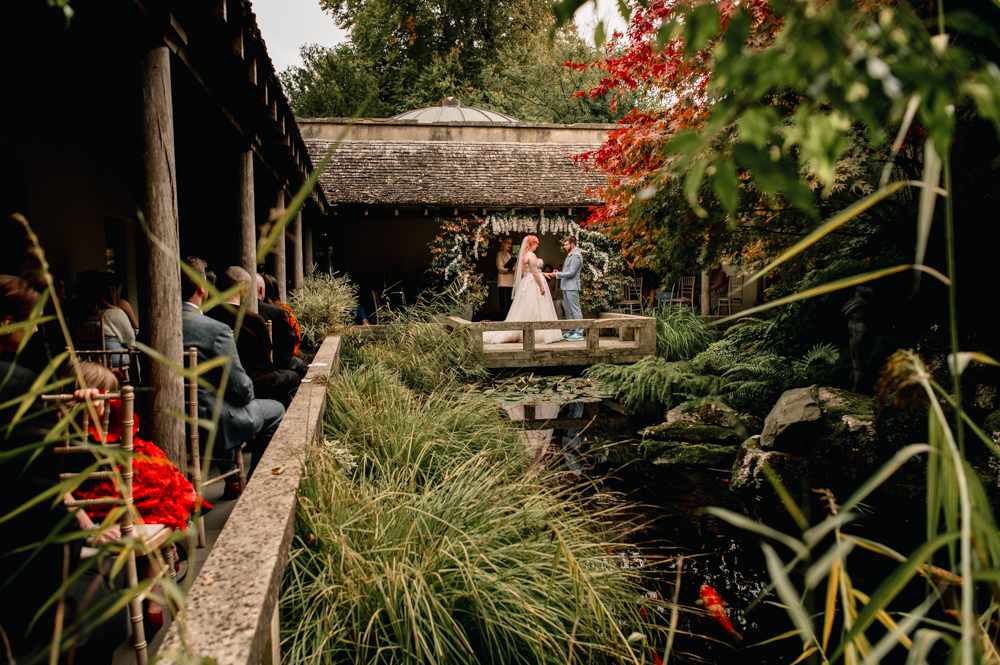 pond side wedding ceremony at Matara centre cotswolds
