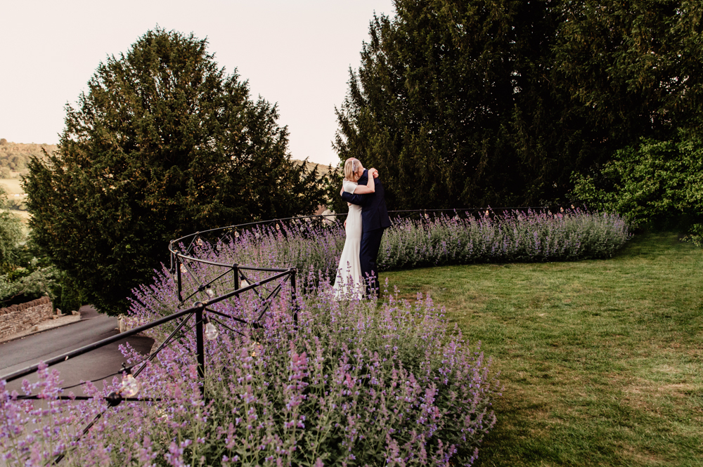 bride and groom in lavender wedding