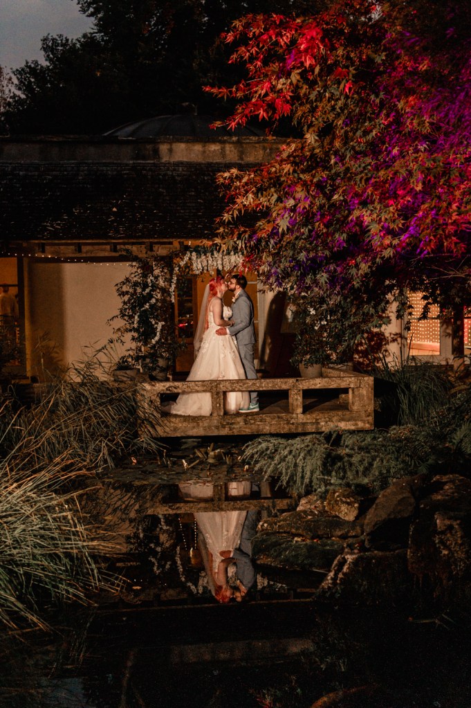 bride and groom dramatic night courtyard matara centre cotswolds