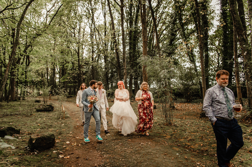wedding guests walking in a wood forest wedding matara