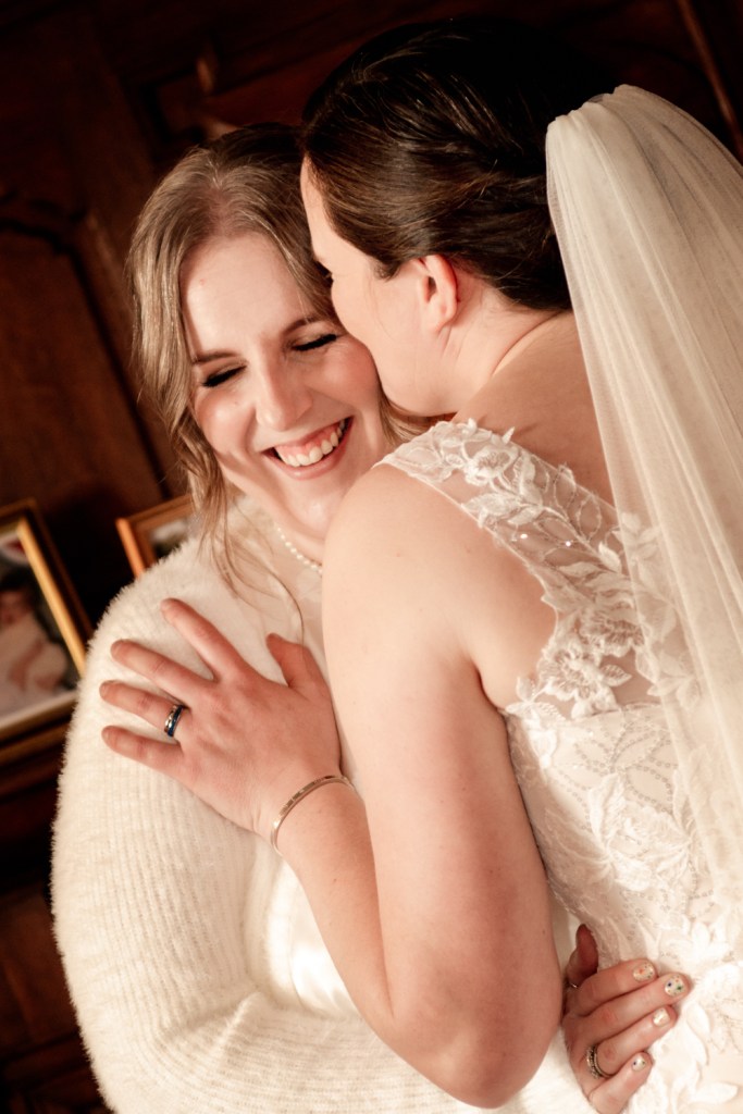 two brides kissing 