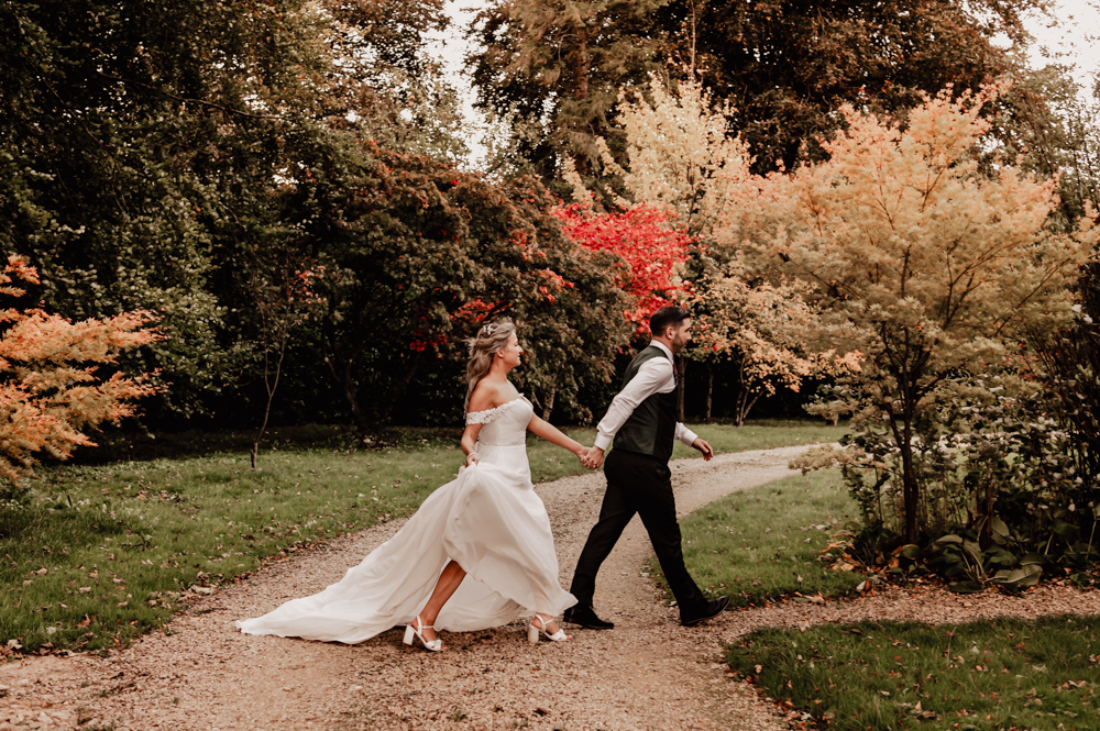 bride and groom walking october autumn wedding