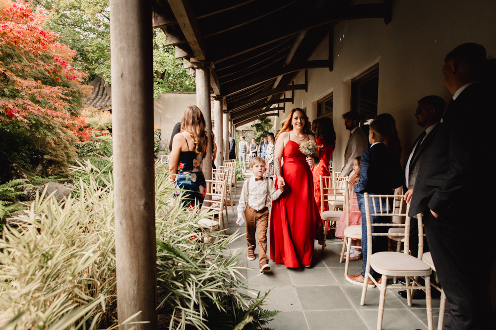 brodemaids going down aisle