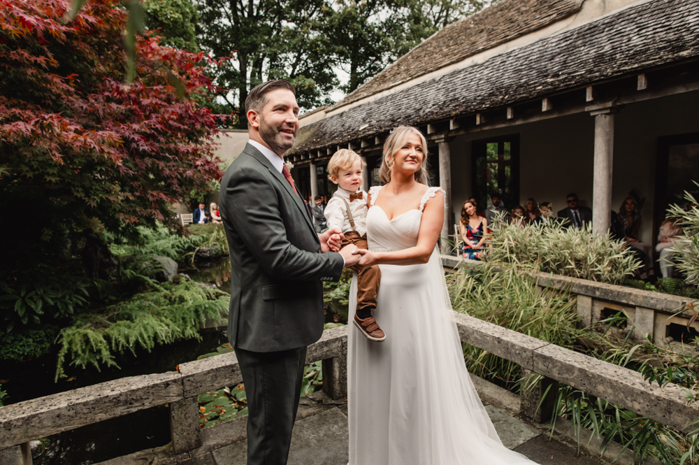 outdoor wedding cotswold by carp pond