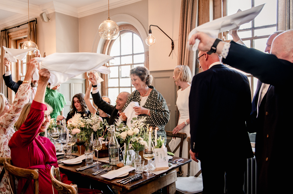 bride and groom entrance napkin waving