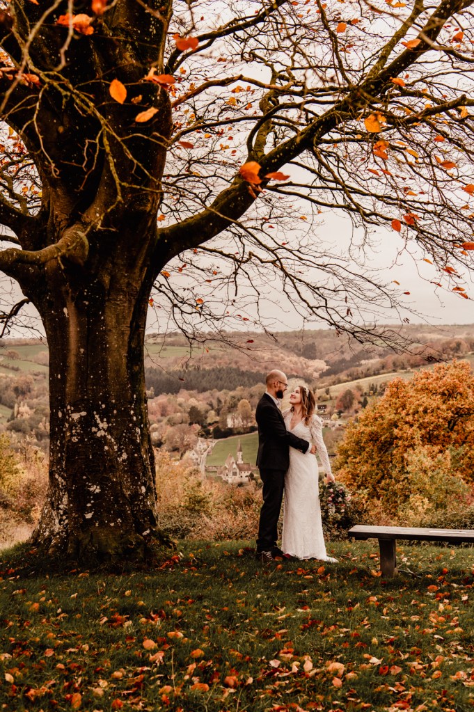 bride and groom under a tree wedding photography