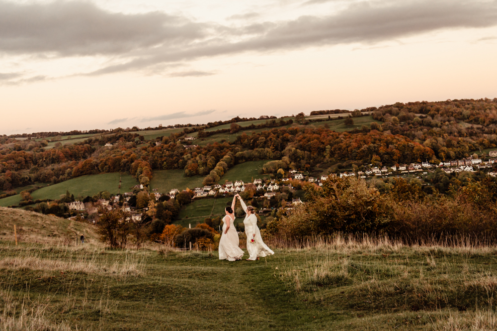 two brides  in the countryside old lodge wedding