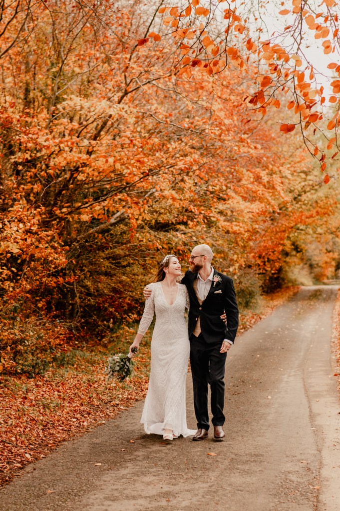 couple walking colouful nature uk wedding