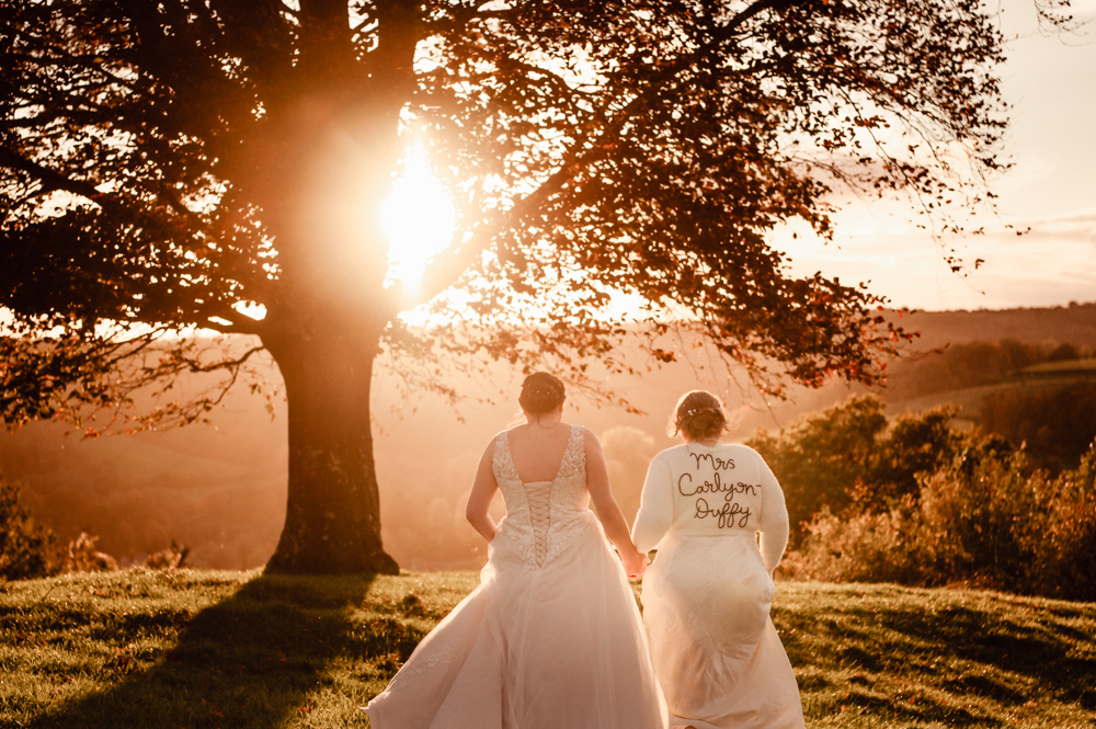 two brides sunset wedding old lodge cotswolds