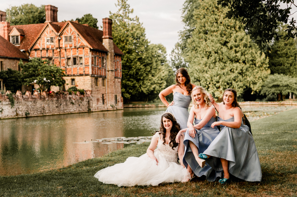 bride and bridesmaids portrait by castle moat