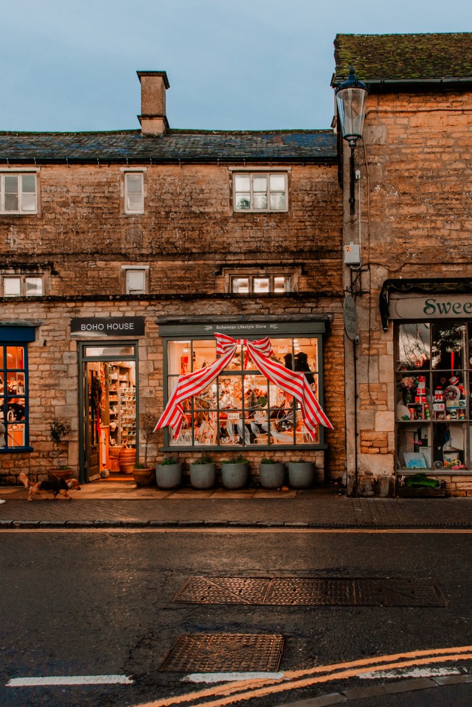 shops decorated for Christmas Cotswolds UK