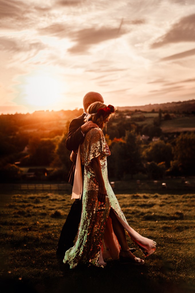bride and groom at sunset dramatic wedding photography