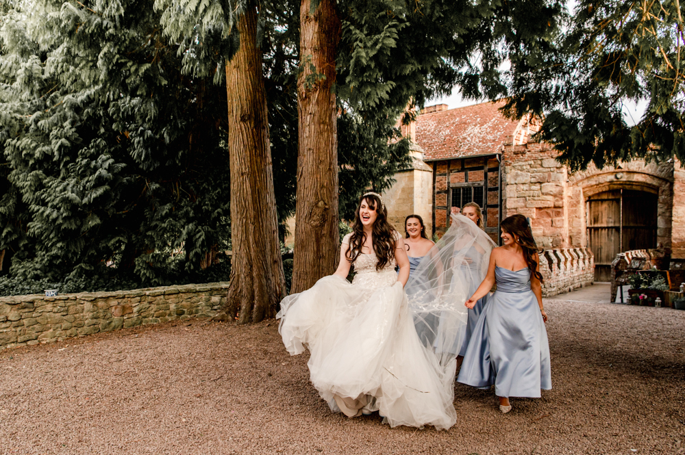 bride and bridesmaids in a castle setting 