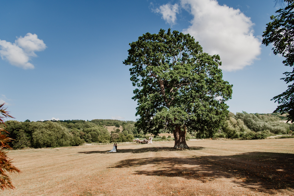 Bride and groom in an English countryside