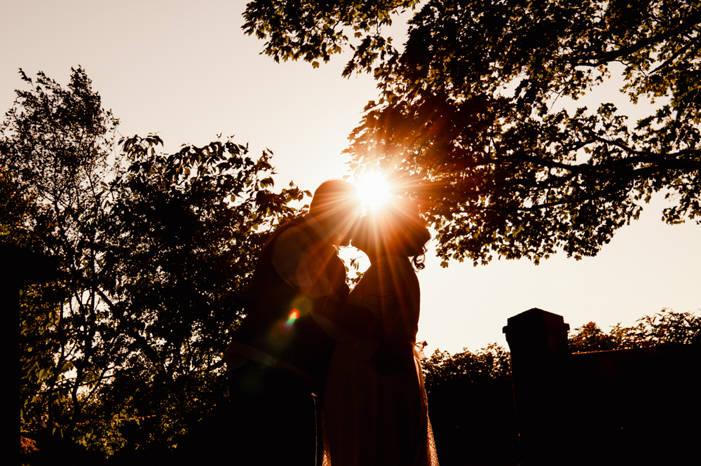 dramatic sunset bride and groom photo at matara centre wedding venue 