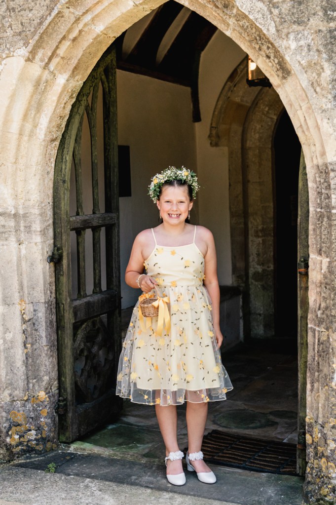 flower girl in a yellow dress