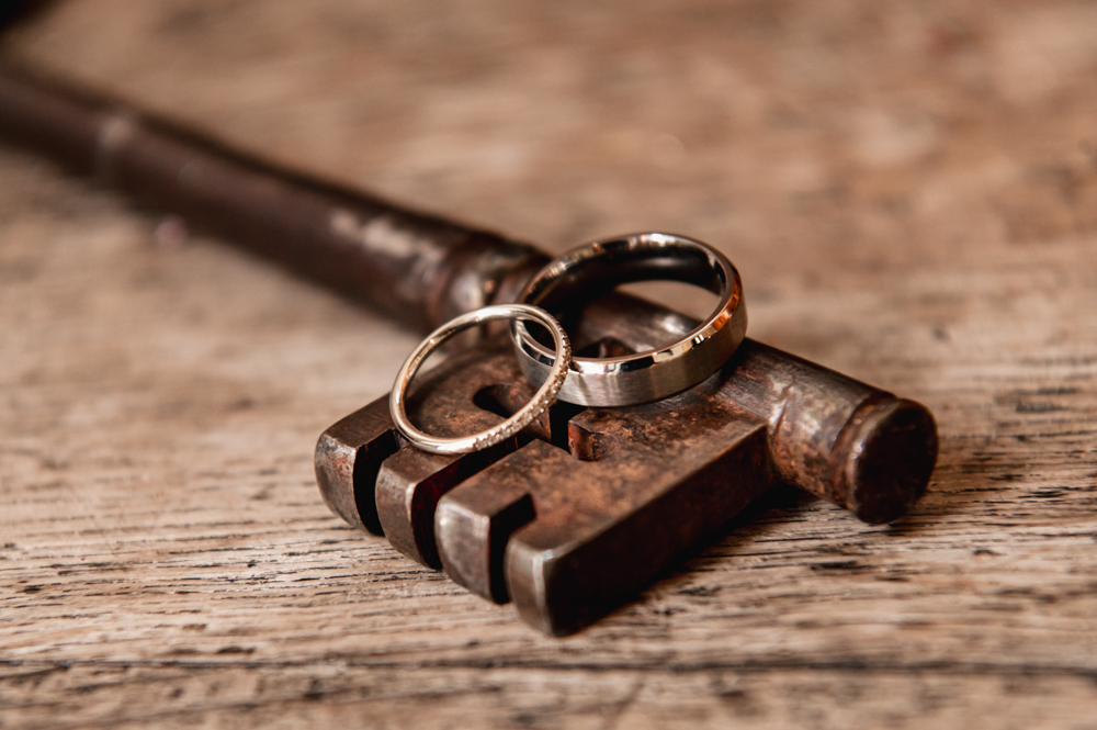 wedding rings on a historic church key
