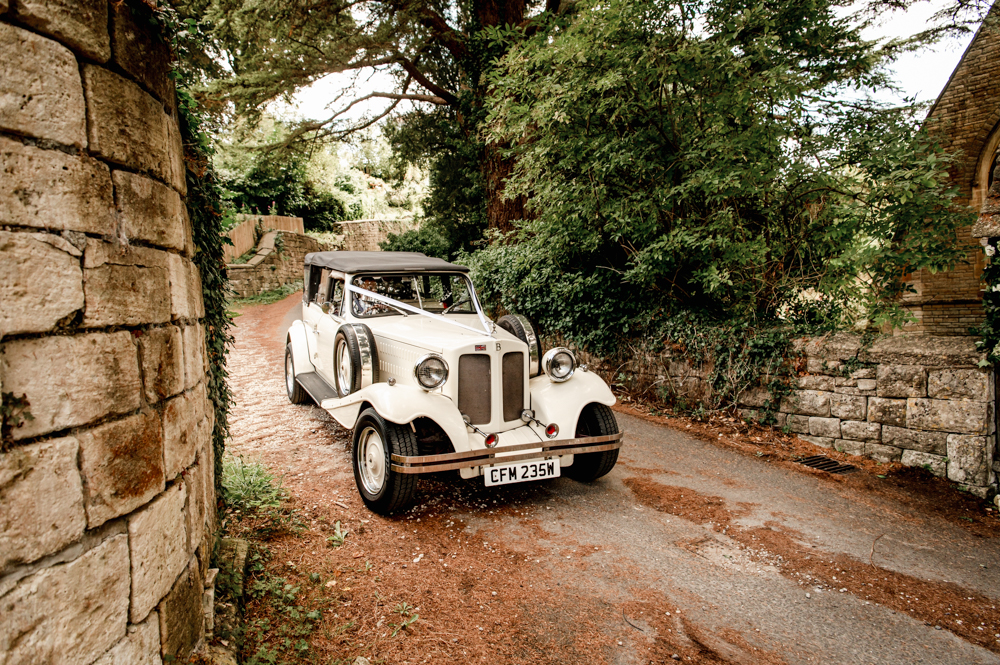 vintage wedding car in the cotswolds