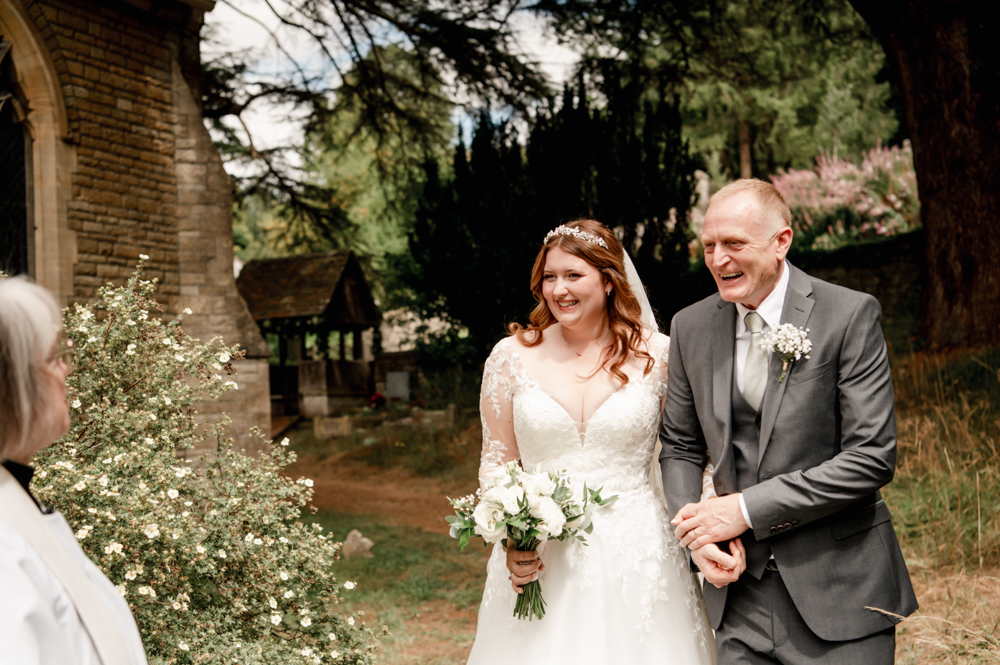 bride meeting the vicar cotswold wedding